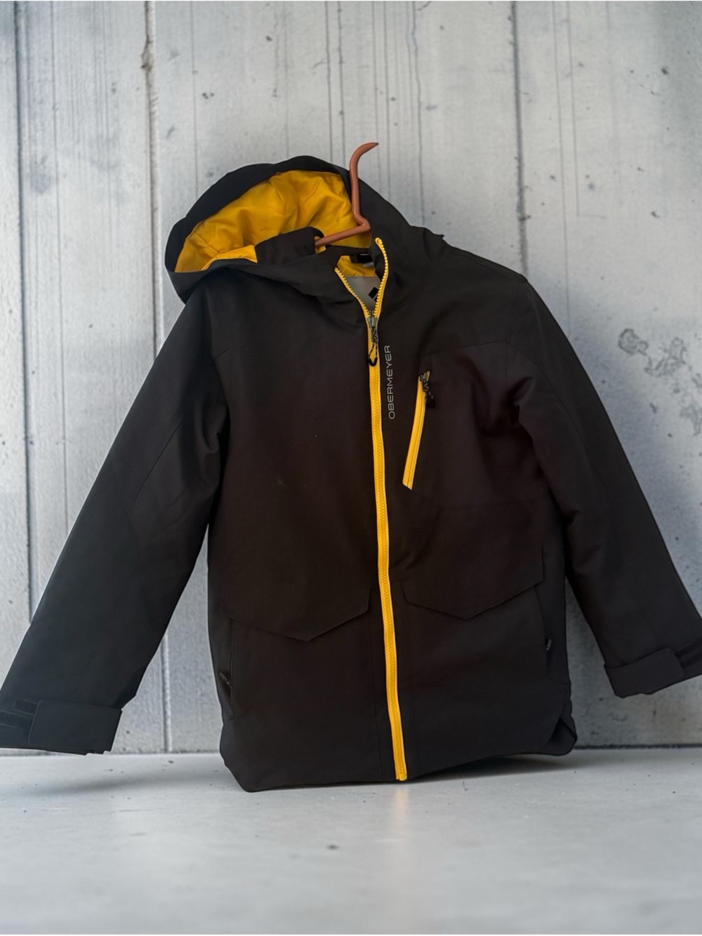 Obermeyer Black Hooded Ski Jacket with Yellow Trim